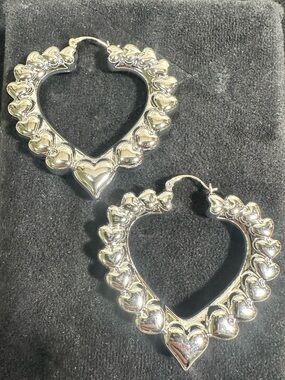 MCM Silver Toned Puffy Heart Oversized Hoop Style Earrings